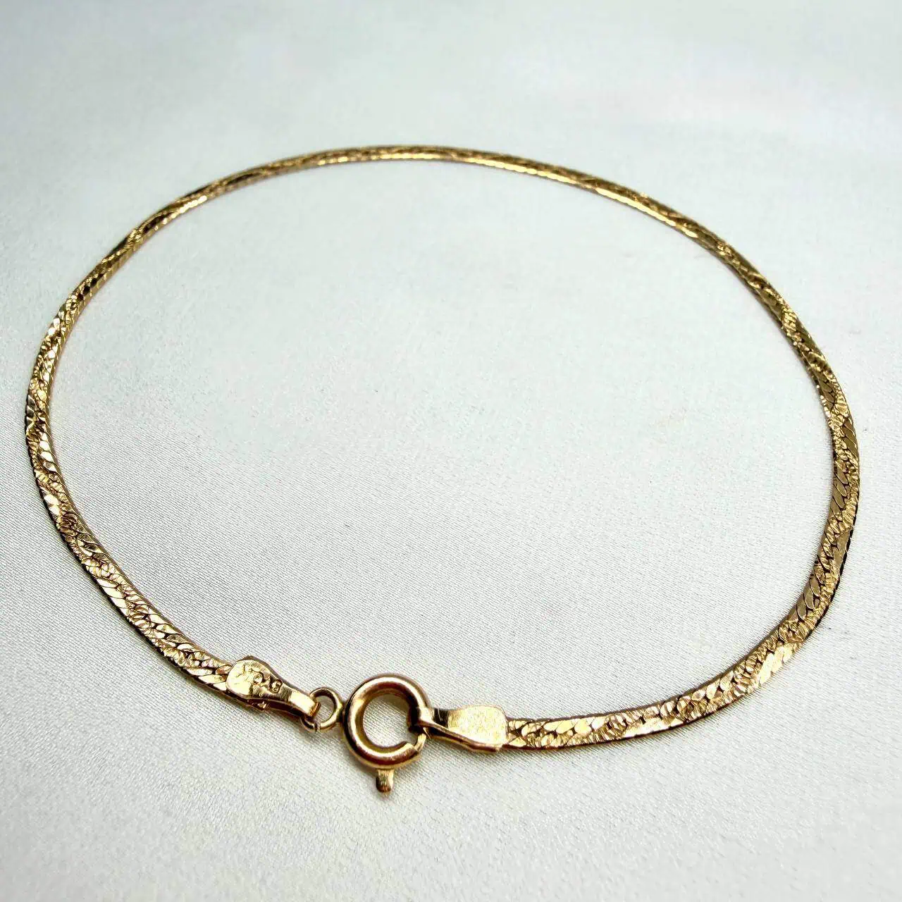 Золотий браслет "Змійка" фото