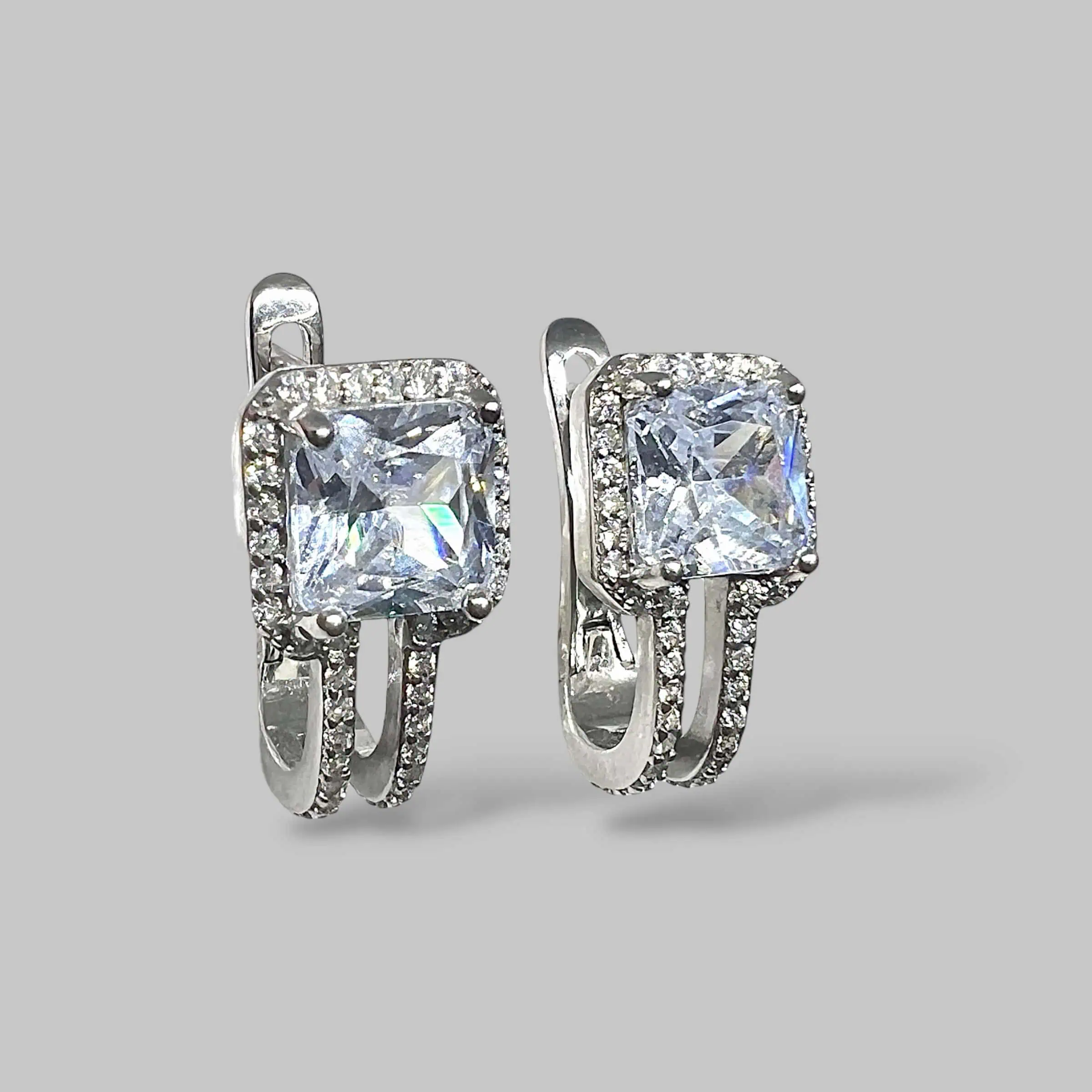 Срібні сережки "Платиновий тріумф" фото