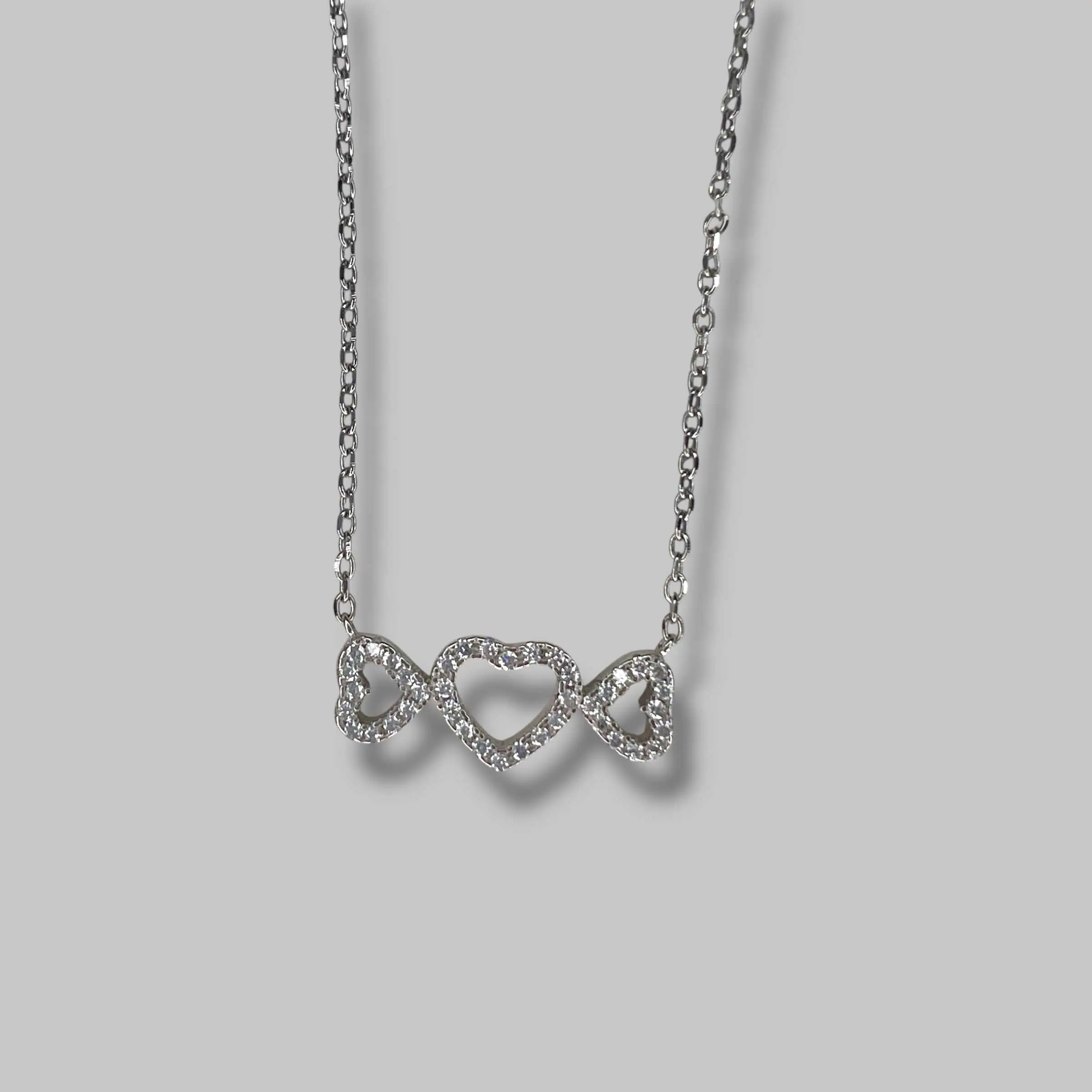 Срібне кольє "Тріо сердець" фото