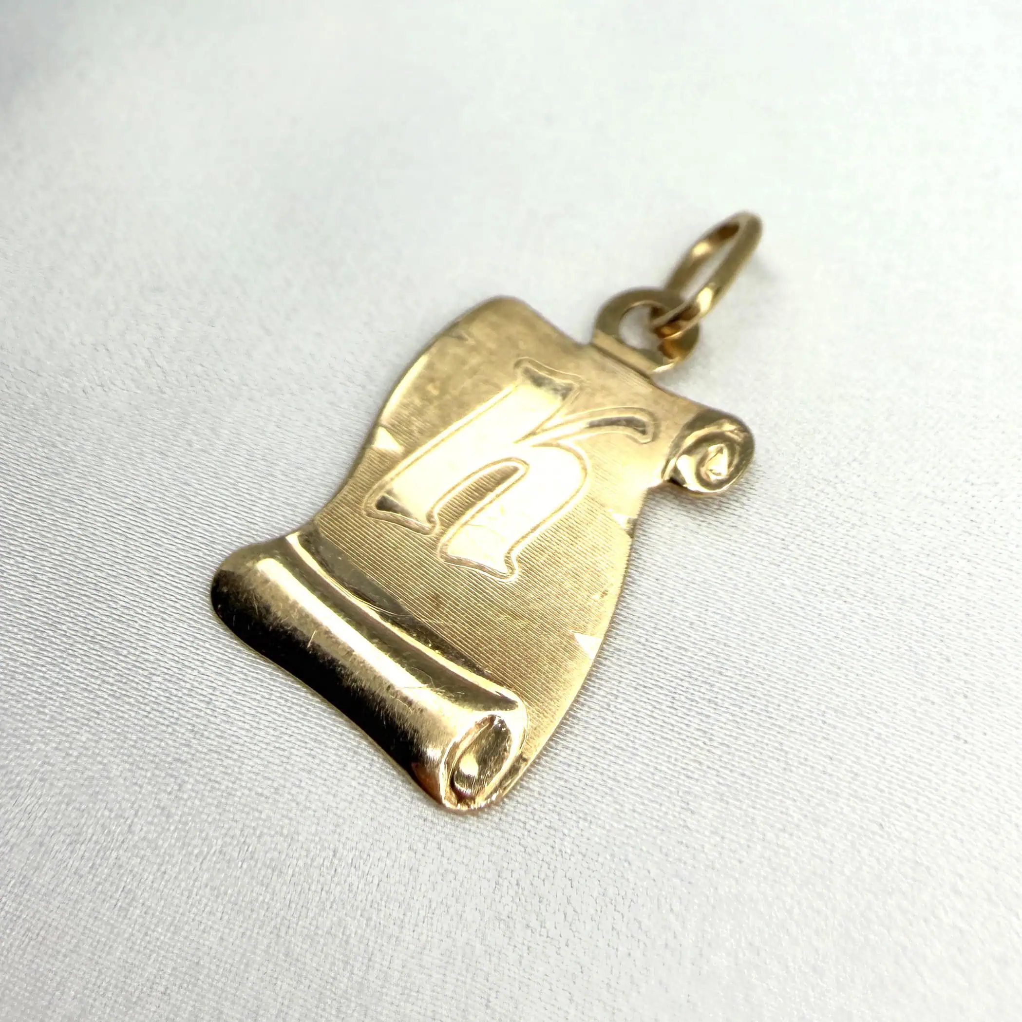 Золотий підвіс "Пластинка з буквою "К" фото