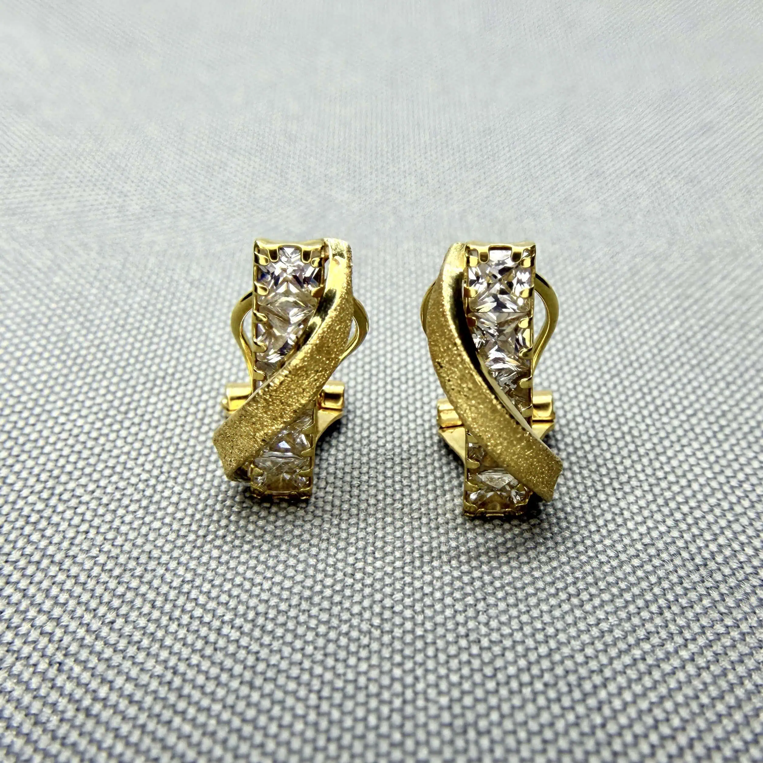 Золоті сережки "Стрічка" фото