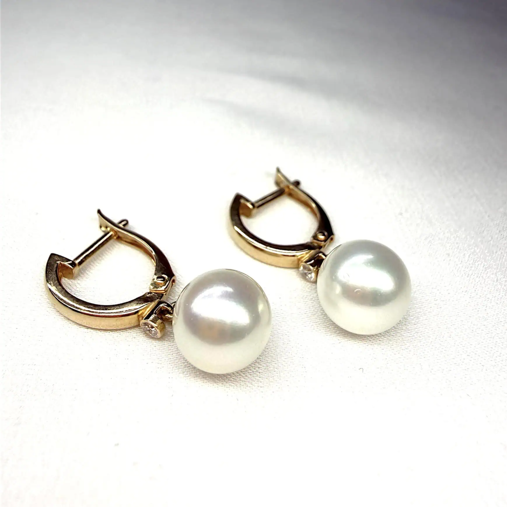 Золоті сережки "Краплина-перлина" фото