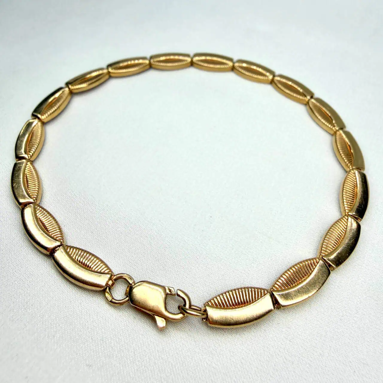 Золотий браслет " Розкішні форми" фото