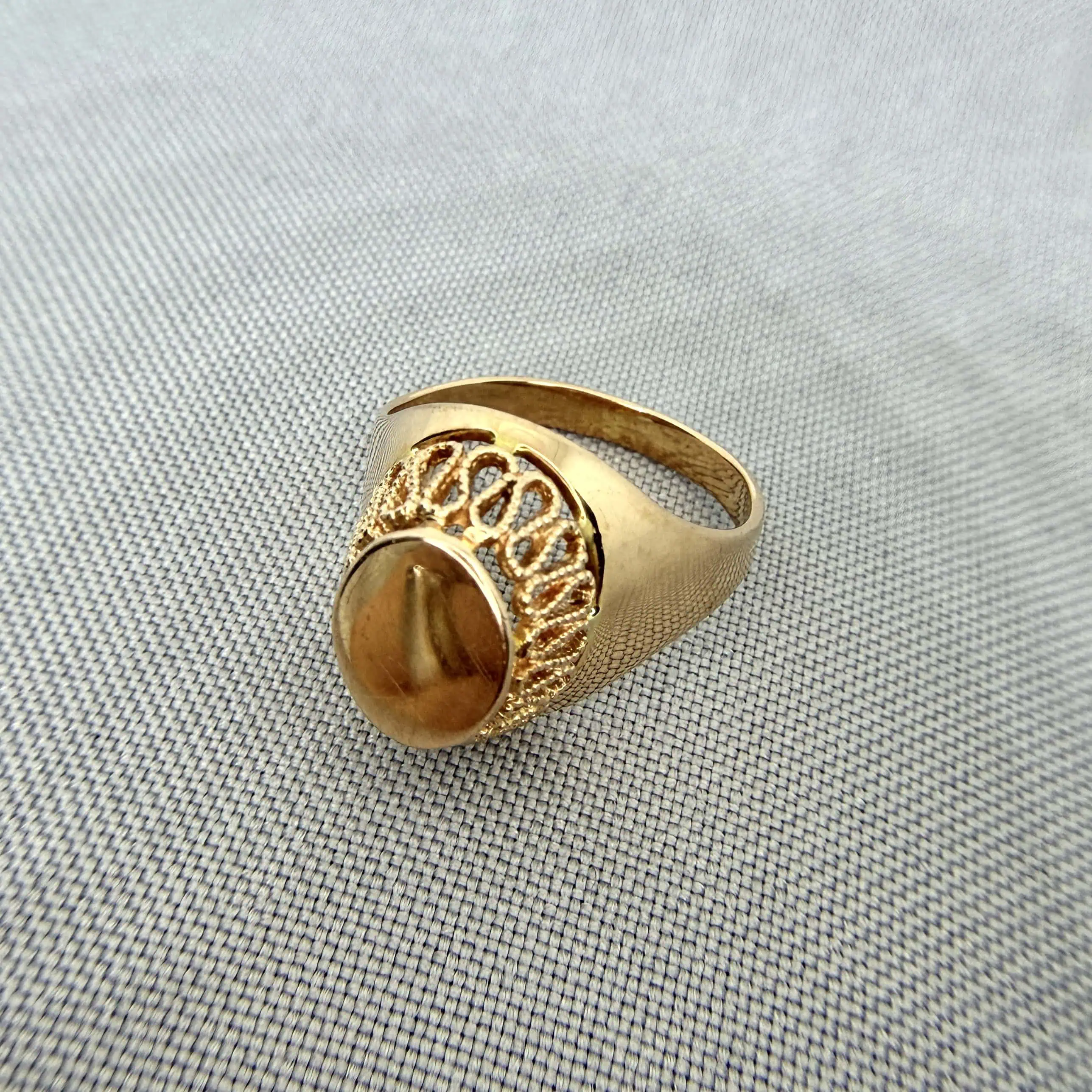 Золота каблучка "Час" фото