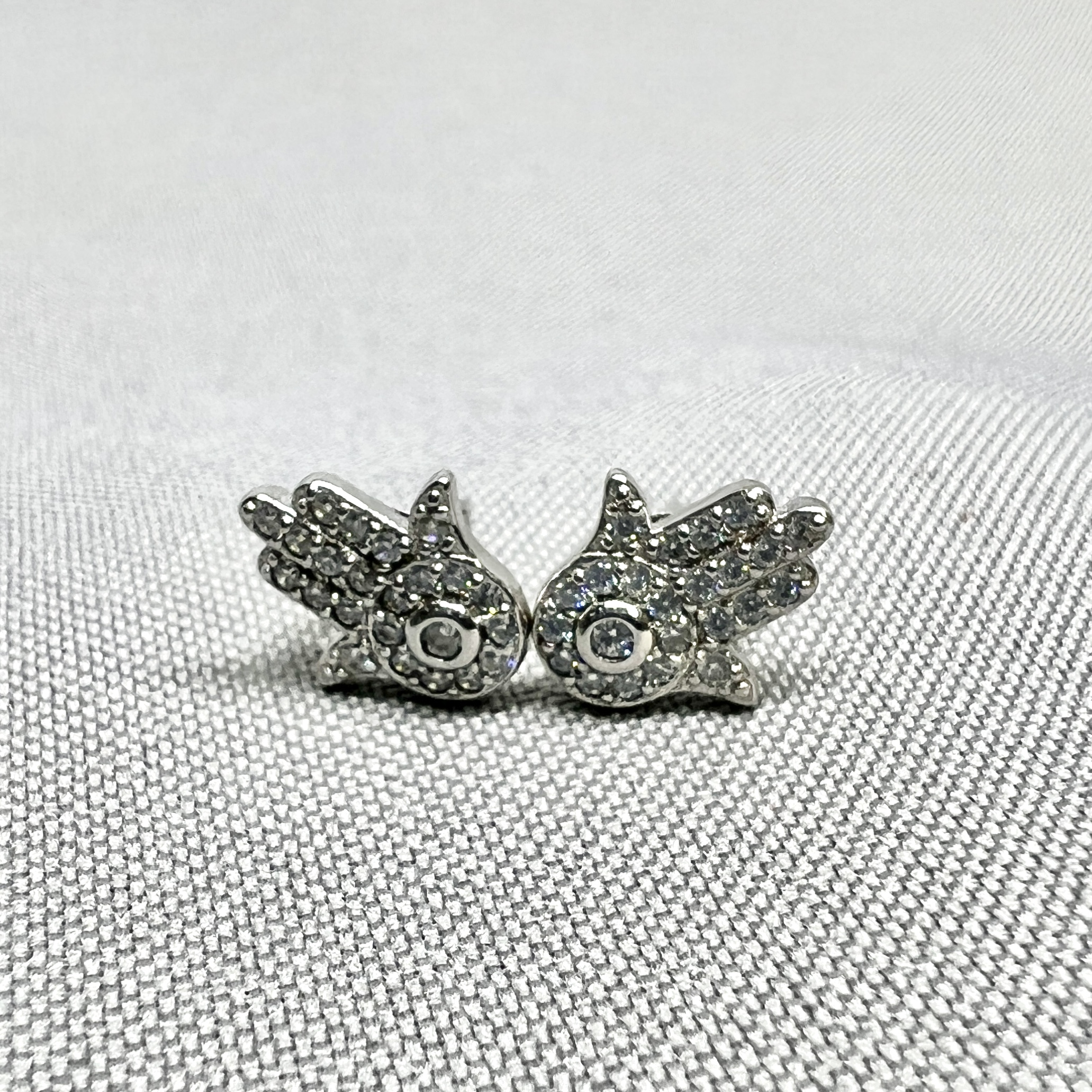 Срібні сережки "Долоня Хамса" фото