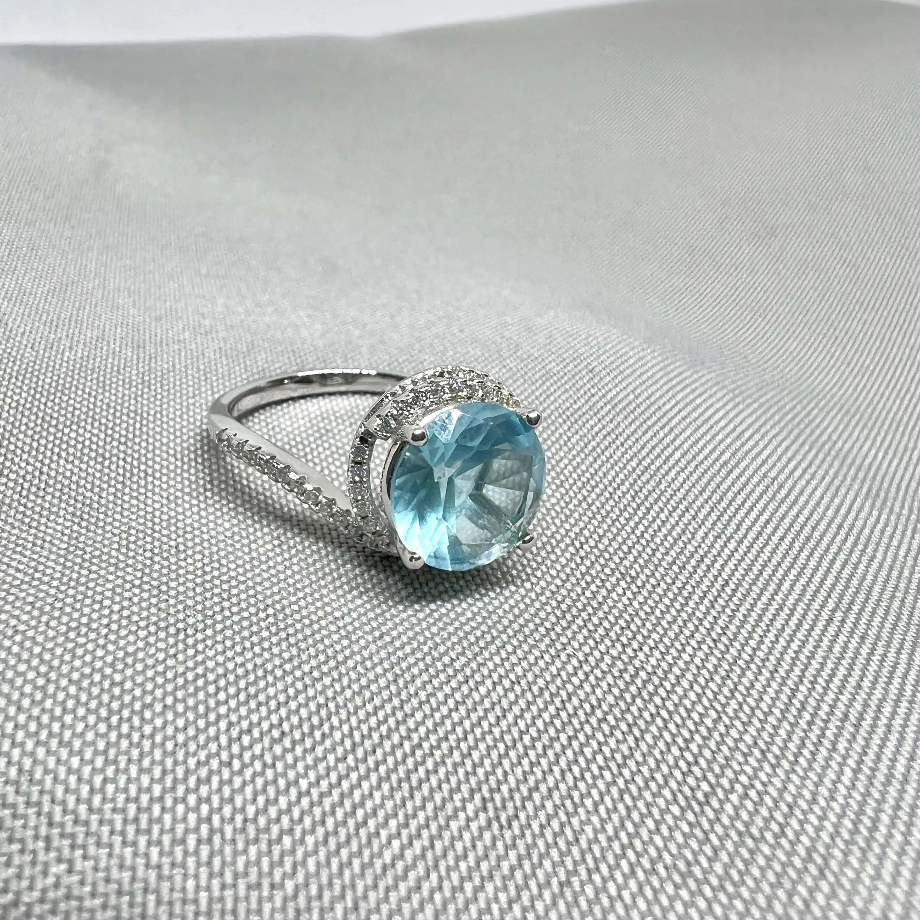 Срібна каблучка "Блакитна планета" фото