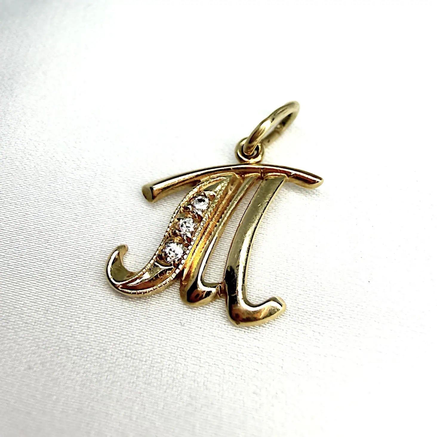 Золотий підвіс "Буква "Т" фото