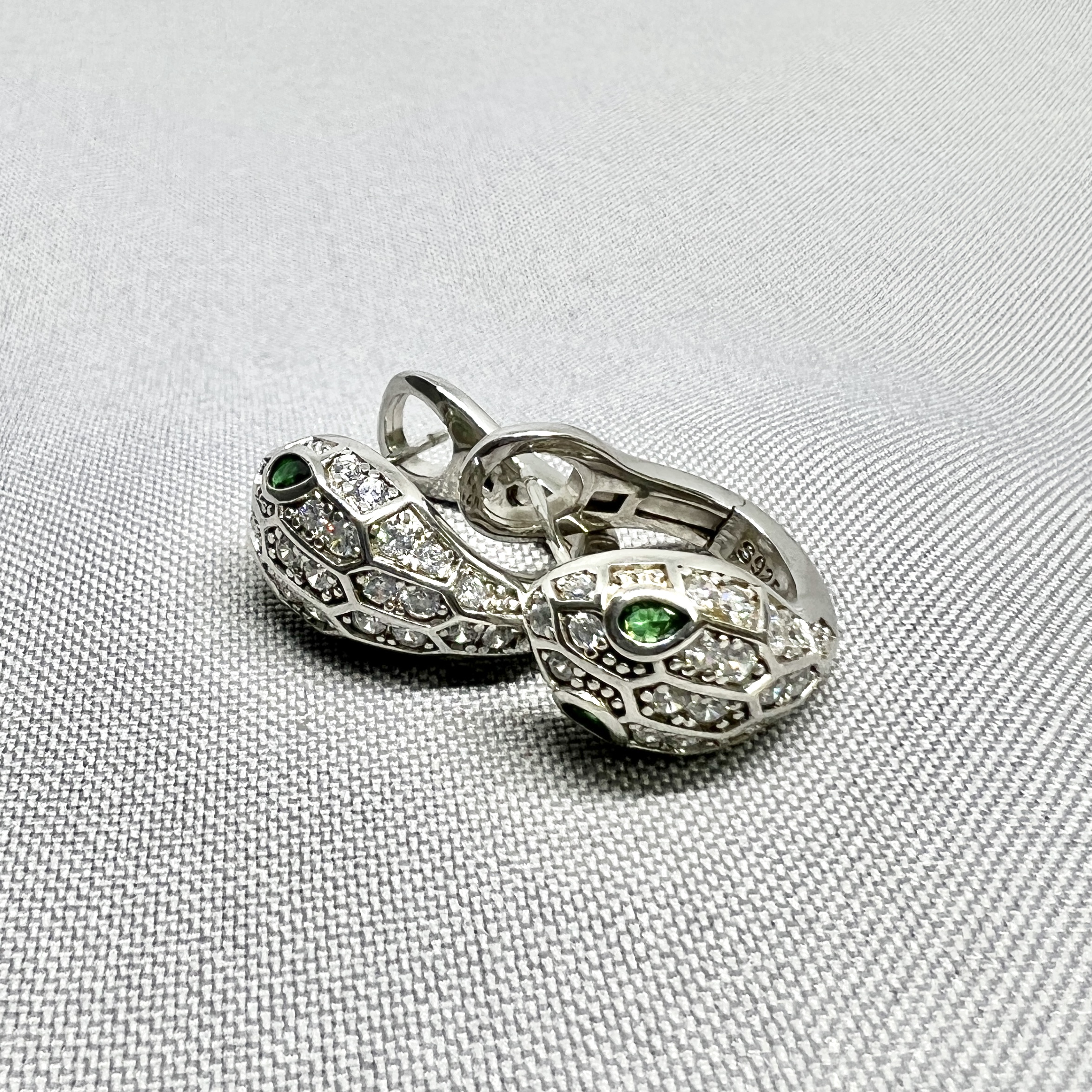 Срібні сережки "Мудрість кобри" фото